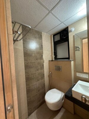 Bathroom in 3 BHK Apartment at Mahindra Nestalgia, Pimpri – for Rent