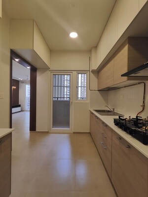 Kitchen in 3 BHK Apartment at Bhartiya Nikoo Homes Phase 2, Thanisandra Main Road – for Rent
