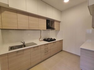 Kitchen in 3 BHK Apartment at Bhartiya Nikoo Homes Phase 2, Thanisandra Main Road – for Rent