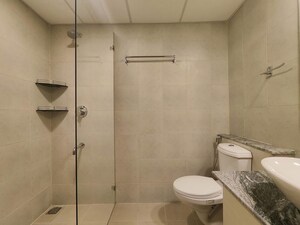 Bathroom in 3 BHK Apartment at Bhartiya Nikoo Homes Phase 2, Thanisandra Main Road – for Rent