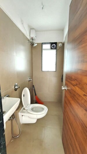 Bathroom in 2 BHK Apartment at Je and Vee Madhuban, Malad East – for Rent