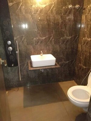Bathroom in 3 BHK Apartment at Ganesh Malabar County II, Near Nirma University On Sg Highway – for Rent