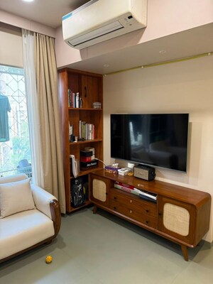 Living Room in 1 BHK Apartment at Swiss Corner, Andheri West – for Rent