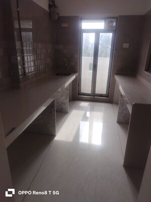 Kitchen in 2 BHK Apartment at MK Gracia, Amboli – for Sale