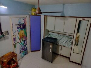 Living Room in 2 BHK Apartment at Swastik Park CHS, Ghodbunder Road – for Sale