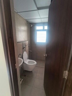 Bathroom in 3 BHK Apartment at Puravankara Silversands, Mundhwa – for Rent