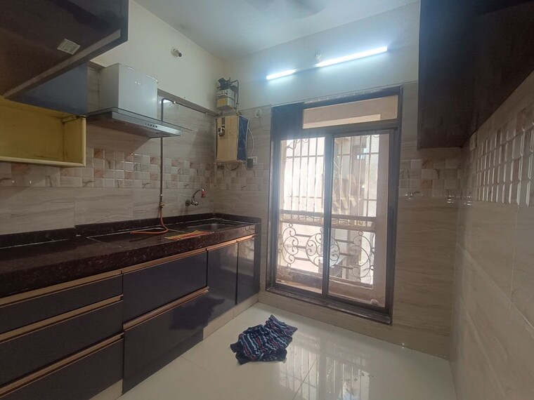 Kitchen/pantry, paradise-sai-sapphire 1 Bedroom 700 Sq.Ft. Apartment In Ulwe Navi Mumbai 10554526