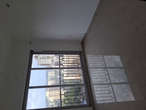 Living Room in 2 BHK Apartment at Apex Green Wood, Borivali East – for Rent