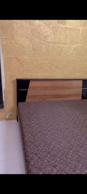 Bedroom in 2 BHK Apartment at Chandrakant Dhuru Wadi – for Sale