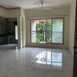 Room in 1.5 BHK Apartment at Royal Eksar Apartment, Roshan Nagar – for Sale