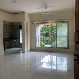 Kitchen in 1.5 BHK Apartment at Royal Eksar Apartment, Roshan Nagar – for Sale