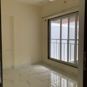 Room in 1.5 BHK Apartment at Royal Eksar Apartment, Roshan Nagar – for Sale