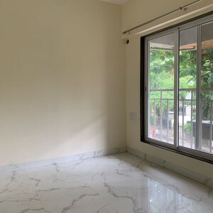 Room in 1.5 BHK Apartment at Royal Eksar Apartment, Roshan Nagar – for Sale