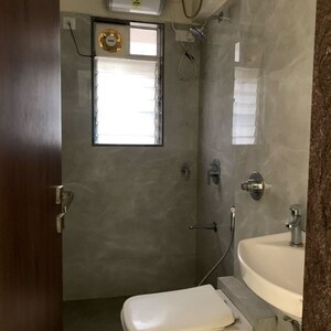 Bathroom in 1.5 BHK Apartment at Royal Eksar Apartment, Roshan Nagar – for Sale