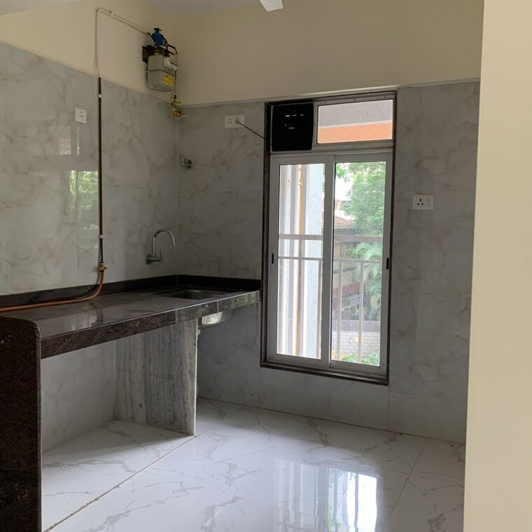 Kitchen, royal-eksar-apartment 1.5 Bedroom 535 Sq.Ft. Apartment In Roshan Nagar Mumbai 10555874