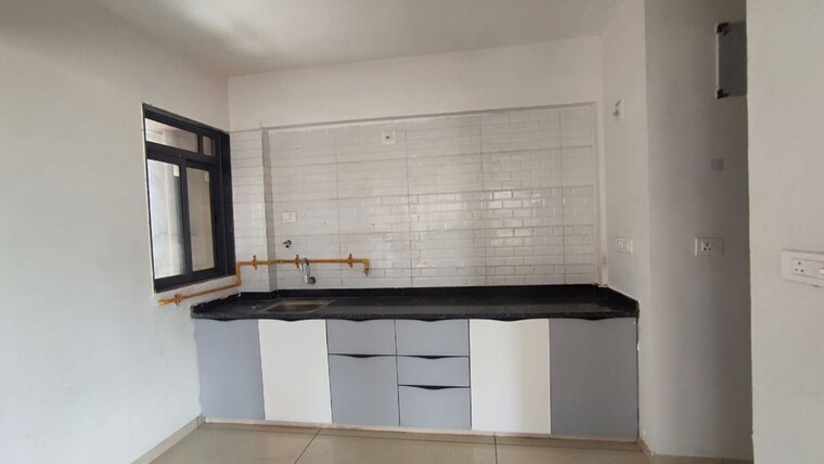Kitchen, shri-brahmani-vishakha-olivia 3 Bedroom 1002 Sq.Ft. Apartment In Tragad Ahmedabad 10555859