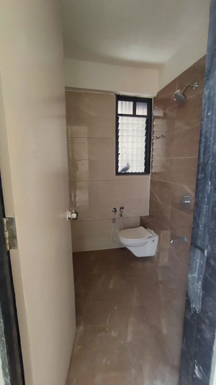 Bathroom, shri-brahmani-vishakha-olivia 3 Bedroom 1002 Sq.Ft. Apartment In Tragad Ahmedabad 10555859