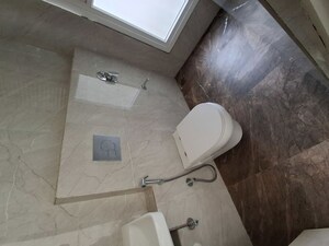 Bathroom in 2 BHK Apartment at Ruparel Sky Green, Kandivali West – for Rent