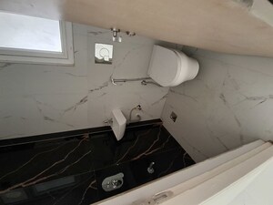 Kitchen in 2 BHK Apartment at Ruparel Sky Green, Kandivali West – for Rent