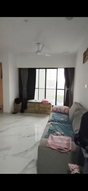 Living Room in 2 BHK Apartment at Dev Leo Tower, Oshiwara – for Rent