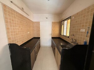 Kitchen in  Apartment at GK Rose Mansion, Punawale – for Rent