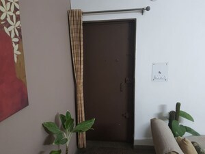 Living Room in 2 BHK Apartment at Alaknanda – for Sale