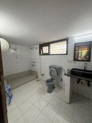 Bathroom in 1 BHK Builder Floor at Kalkaji – for Rent