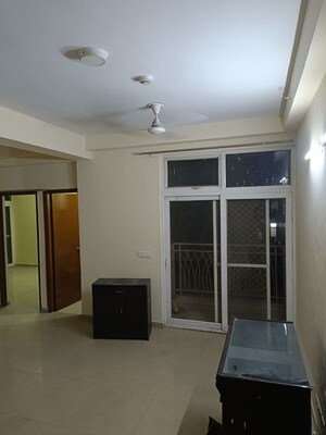 Living Room in 2 BHK Apartment at Mahagun Mywoods, Sector 16c Greater Noida – for Rent