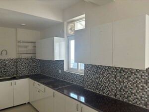 Kitchen in 3 BHK Apartment at ROF Aalayas, Sector 102 – for Rent