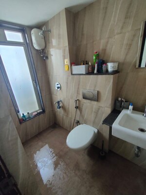 Bathroom in 1 BHK Apartment at Lodha Quality Home Tower 2, Majiwada – for Rent