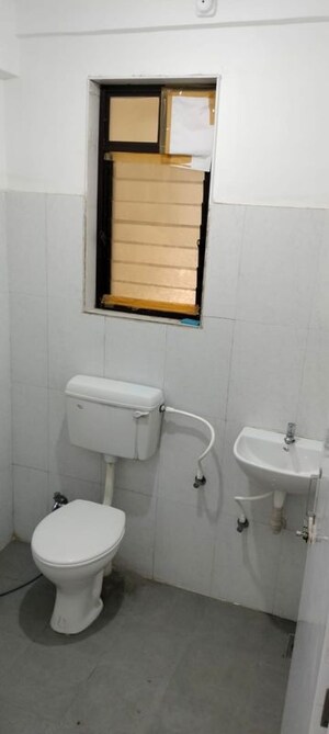 Bathroom in 1 BHK Apartment at Raymond Aashiyana, Vartak Nagar – for Rent