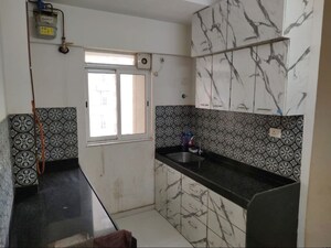 Kitchen in 3 BHK Apartment at Lodha Amara, Kolshet Road – for Rent