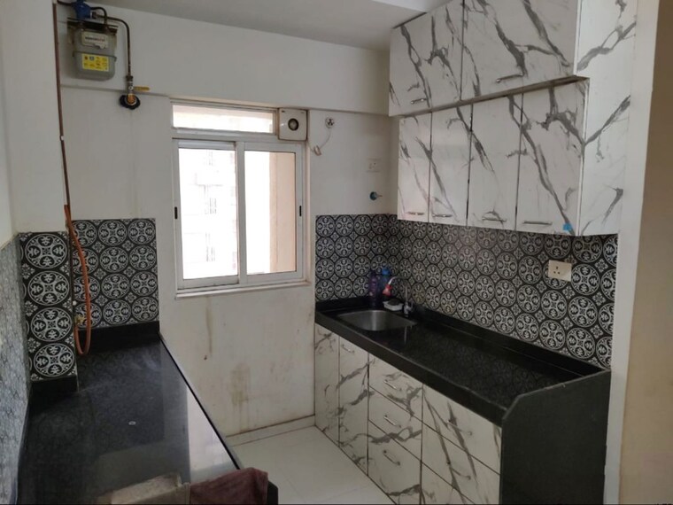 Kitchen, lodha-amara 3 Bedroom 1400 Sq.Ft. Apartment In Kolshet Road Thane 10556532