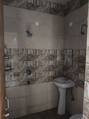 Bathroom in 3 BHK Builder Floor at Dhakoli – for Rent