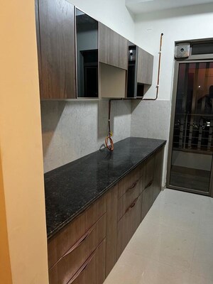 Kitchen in 2 BHK Apartment at Kalpataru Paramount, Kapur Bawdi – for Rent