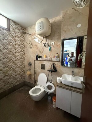Bathroom in 2 BHK Builder Floor at Kalkaji – for Rent