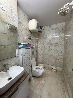 Bathroom in 2 BHK Builder Floor at Kalkaji – for Rent