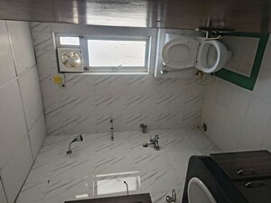Bathroom in 2.5 BHK Apartment at Nimbus The Golden Palm, Sector 168 – for Rent