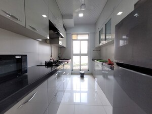 Kitchen in 2 BHK Apartment at Godrej Emerald, Ghodbunder Road – for Rent