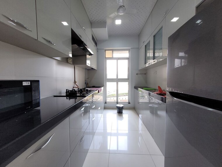 Kitchen, godrej-emerald 2 Bedroom 712 Sq.Ft. Apartment In Ghodbunder Road Thane 10556681