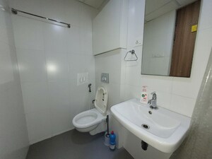 Bathroom in 2 BHK Apartment at Godrej Emerald, Ghodbunder Road – for Rent
