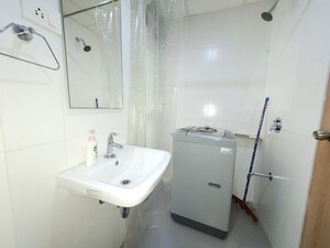 Bathroom in 2 BHK Apartment at Godrej Emerald, Ghodbunder Road – for Rent