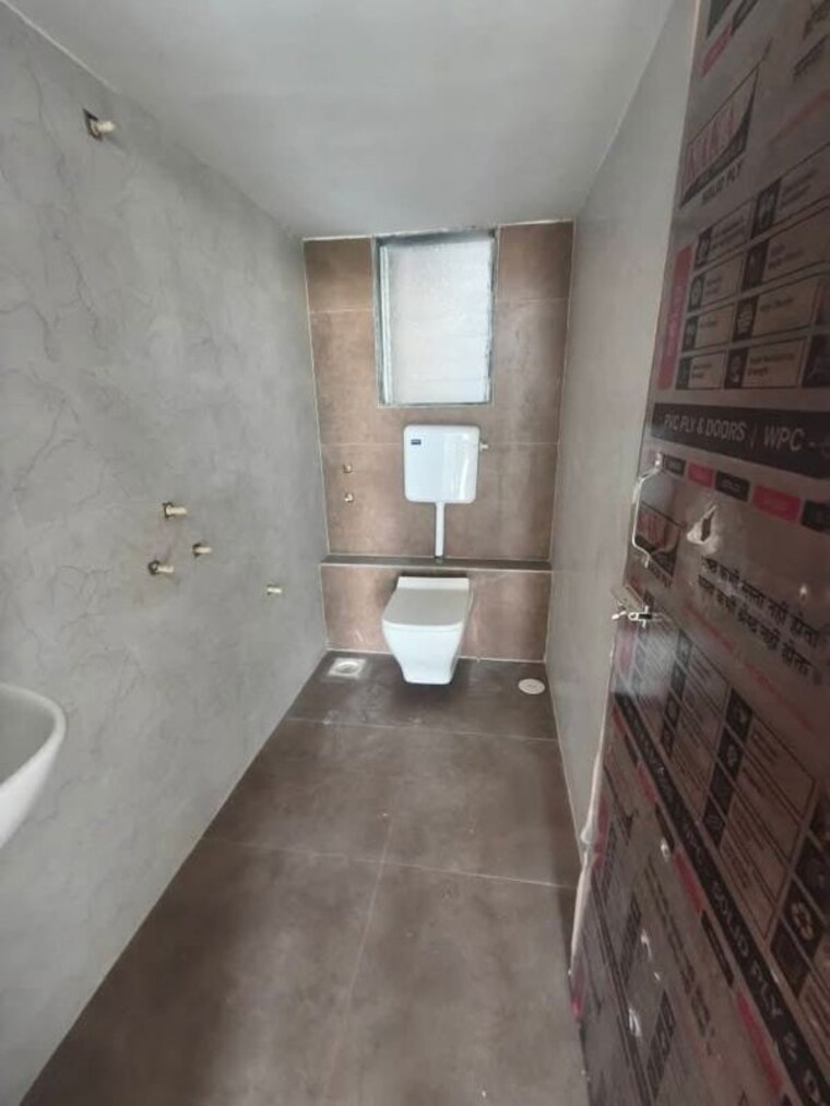 Bathroom, rs-qa-riverfront 1 Bedroom 450 Sq.Ft. Apartment In Taloja Navi Mumbai 10556634