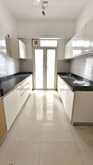 Kitchen in 2 BHK Apartment at Omkar Alta Monte, Malad East – for Rent