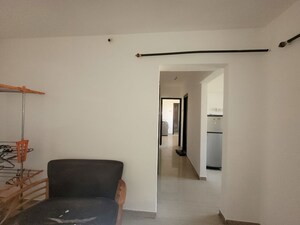 Living Room in 1 BHK Apartment at Unnati Woods CHS, Kasarvadavali – for Rent