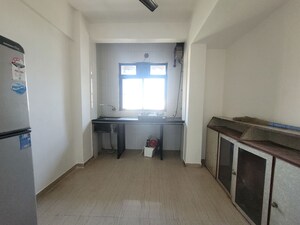Building Lobby in 1 BHK Apartment at Unnati Woods CHS, Kasarvadavali – for Rent