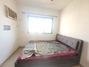 Bedroom in 1 BHK Apartment at Unnati Woods CHS, Kasarvadavali – for Rent