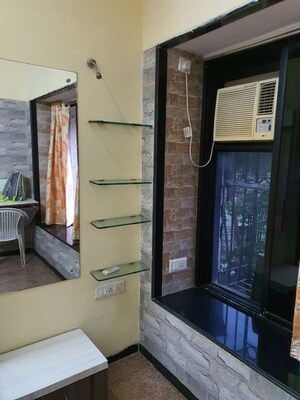 Living Room in 2 BHK Apartment at Ashish CHS Andheri, Andheri West – for Rent