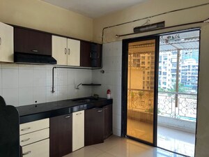 Kitchen in 2 BHK Apartment at Palm Paradise, Sanpada – for Rent
