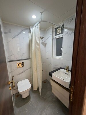 Bathroom in 3 BHK Apartment at Smart World Orchard, Sector 61 – for Rent